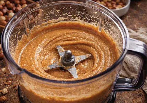 مراحل تبدیل فندق به کره فندق مخلوط کن